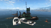 A tug boat with two police boats off the east coast of the island