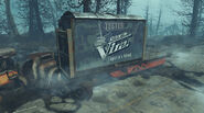 Vim Ambassador truck carrying custom-painted T-51 power armor