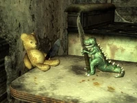 Fight between a dino and a teddy bear in the Gray