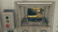 The Pip-Boy 2000 Mark VI in its case, by the player character's room exit