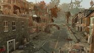 The Main Street of Harpers Ferry, with numerous ruined buildings and instruments