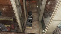 FO76TP The Foundry (Steel ingot 12).jpg (1.99 MB) In Twin Cauldrons area. On top of some metal crates.