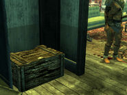 The key can be found in a crate inside the lodge