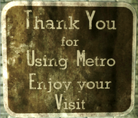 Sign next to metro exits