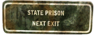 Знак «Следующий поворот — тюрьма штата»