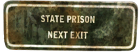 State prison sign before the turn off to the NCRCF