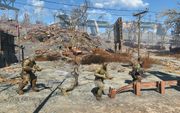 Fo4 rotten landfill super mutants and prisoner.png