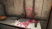 The food paste dispensers and pink stained handprints.