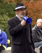 Johnson giving a tribute to Ferret Baudoin during a Fallout 25th Anniversary event in Washington, D.C.[7]