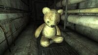 Giant teddy bear found inside the SatCom Array NN-03d (barricaded, only visible through the cracks in the boards or by using console commands)