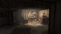 The basement of the homestead where T.S. Wallace has a chemistry station and other tools