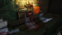 Closer up of blood-stained altar in Helvetia church, featuring fusion core candles