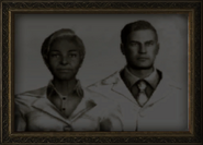 The player character's parents. This photo is also used in Vault 21 in Fallout: New Vegas.