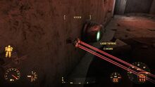 The bugged tripwire, directly in front of the nearest turret. All others have been disarmed at this point, without incident