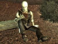 Joshua Graham reading the scripture