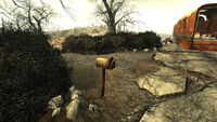 Guns and Bullets, mailbox at Jackknifed Nuka-Cola truck