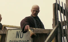 A cleric chanting in an execution