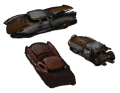 Three sprites from Fallout and Fallout 2, showing wrecked original Corvega.
