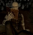 Graham reading scripture in the Sorrows Camp