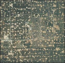 Denver City is surrounded by constellations of oil wells.