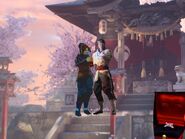 Aiko showing off her engagement ring with Titan Liu Kang outside the Fire Temple
