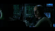 Cypher in the Real World talking with Neo