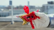 Super Megaforce Blue is holding a Legendary Skyship Key