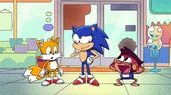 EA ImovUIAAzcFJ.jpg (226 KB) K.O. shows Enid and Radicles a picture of him with Sonic and Tails