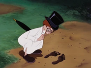 John inspecting Indian footprints
