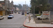 Welcome to the City of HILL VALLEY. The Hill Valley greeting sign at the intersection of Hill and Main in 1985 (on the far right). The name of Hill Valley's mayor, Goldie Wilson, is displayed below that of the city