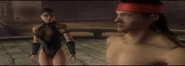 Kitana kongratulating Liu (Shaolin Monks)
