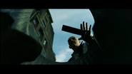 Cypher drops his phone into garbage can to signal the Agents