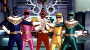 Zeo Rangers are holding a spare Zeo Crystal for Masked Rider to become Masked Rider Super Zeo Mode