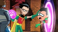 F3d5e5e7081d7205186b2a72c7d06ef7.jpg (131 KB) Robin (Teen Titans 2003 TV Series) shows Robin a picture of him holding a Worlogog