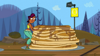 Sierra is the first person on her team to eat the pancakes...