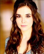 Zoey Deutch as Elizabeth-Jane Logan