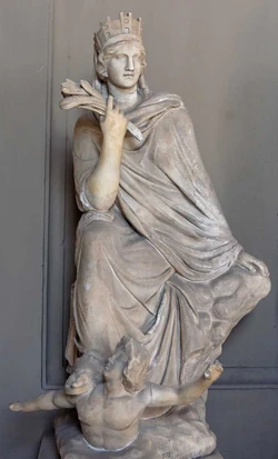 Tique de Antióquia, cópia romana de estátua de bronze de Eutíquides (300 a.C.). A deusa usa uma coroa mural, segura um feixe de espigas de trigo e se apoia sobre um nadador, que representa o  Orontes.