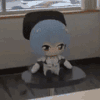 Rei Chiquita spinning in an office chair