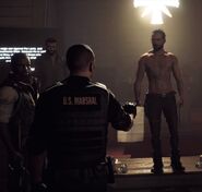Burke serves his arrest warrant.