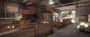 Flatiron Stockyards - Inside of the barn. Note the office and the overhead access options.