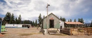 Flatiron Stockyards - Another view of the green shed near the barn. Note the safe inside.