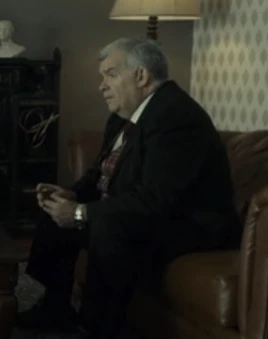 The-law-of-vacant-places-buck-olander-played-by-dan-willmott-listens-to-emmit-and-sy