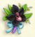 Bracelet de mariée orné d'une orchidée noire.png