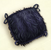 Coussin en plumes noires.png