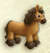 Figurine de cheval marron.png