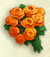 Bouquet de fleurs en laine orange.png