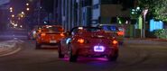 Pink neon lights on the underbelly of the car