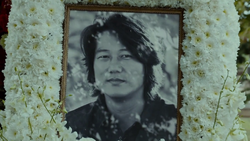 Han's photo at his funeral