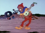 Mushmouth playing the guitar