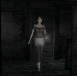 Mio with the flashlight she found